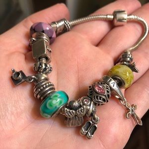 Bracelet with Pandora and Chamila charms